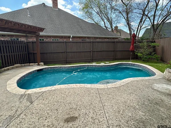 a view of outdoor space yard and swimming pool