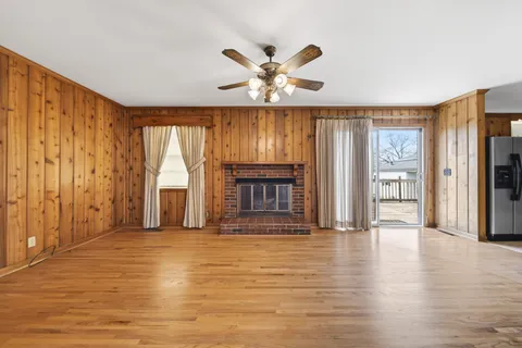 a view of livingroom with furniture and fireplace
