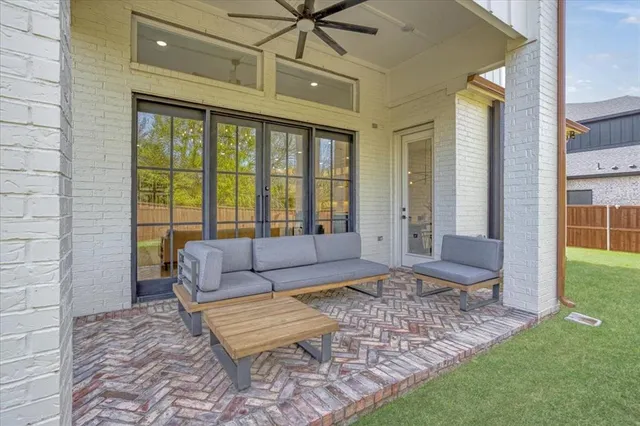 a living room with a couch and a table