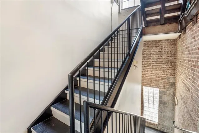 a picture of a bathroom with wooden floor