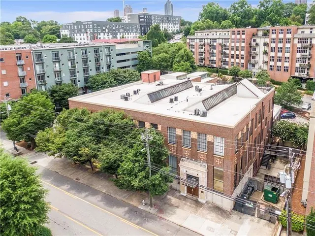 a front view of a building with glass windows