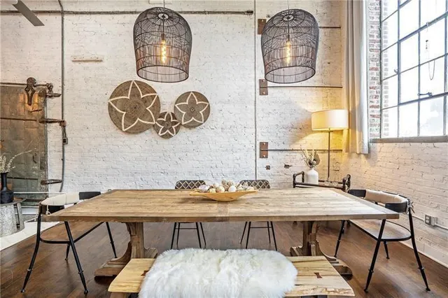 a dining room with furniture and window