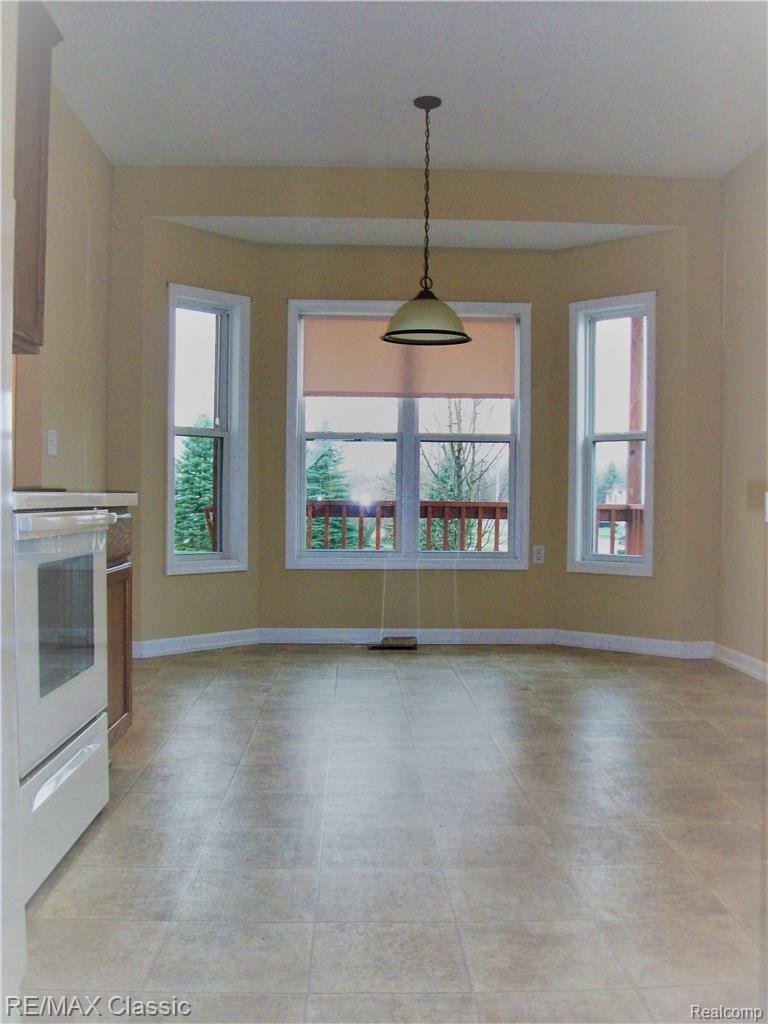 809 Nelson's Ridge Drive, Unit 7 Howell, MI 48843 - Photo 6 of 23 103_1734.jpg
