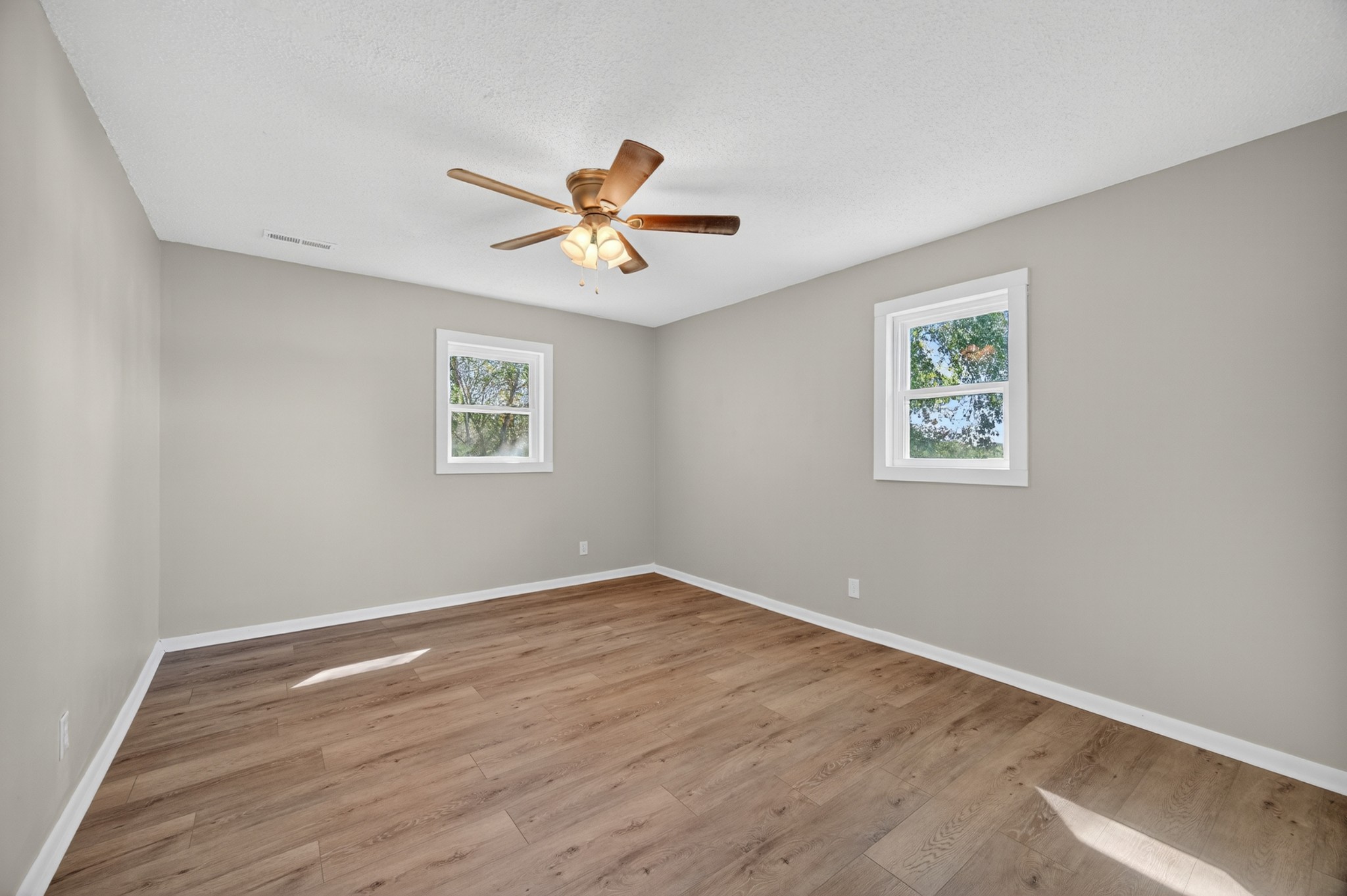 34 South Lincoln Road Fayetteville, TN 37334 - Photo 20 of 31 a view of a big room with wooden floor and windows