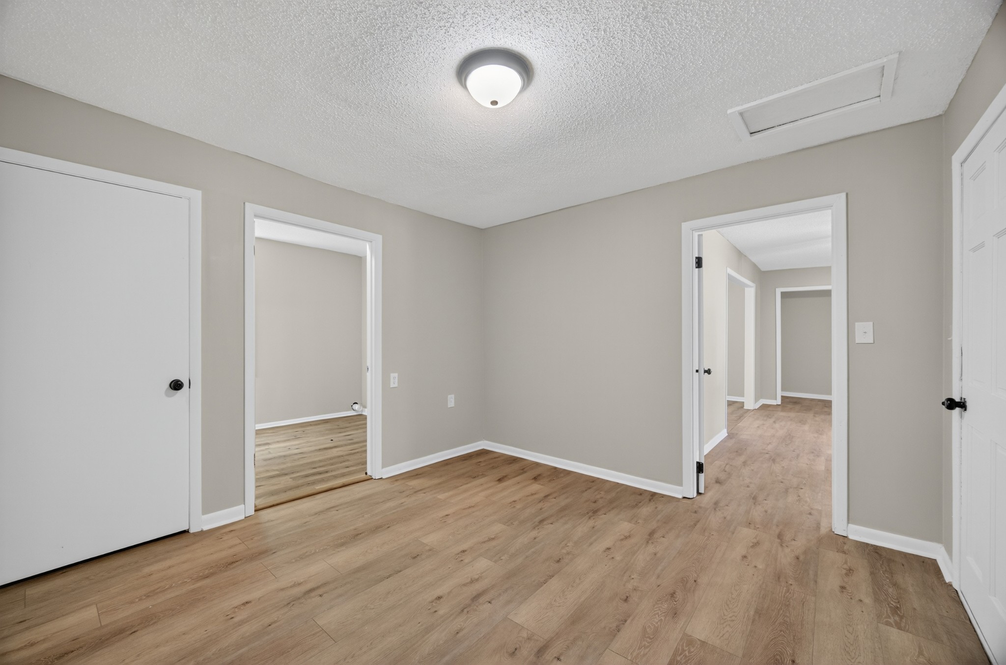 34 South Lincoln Road Fayetteville, TN 37334 - Photo 23 of 31 an empty room with wooden floor and windows