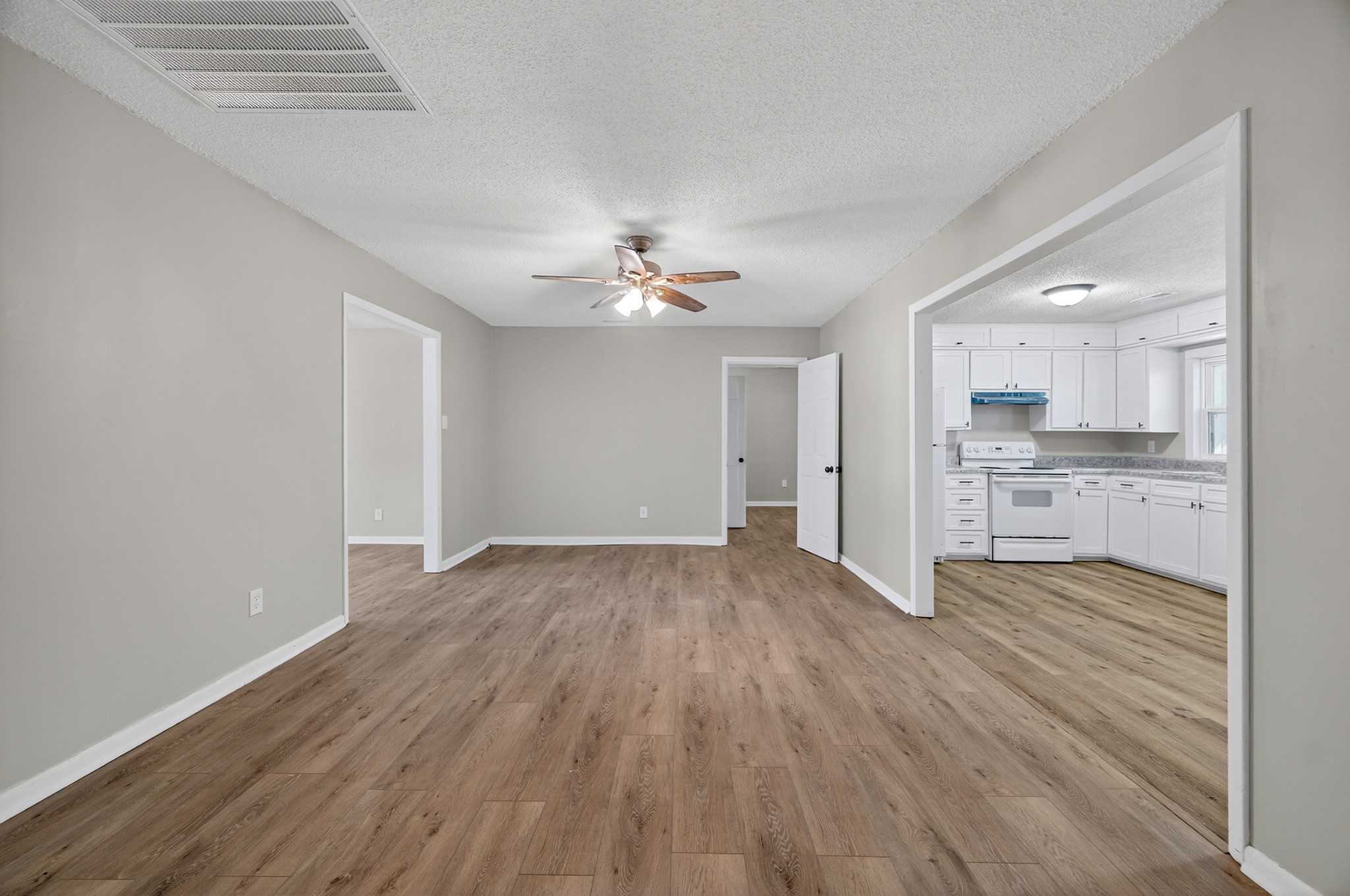 34 South Lincoln Road Fayetteville, TN 37334 - Photo 10 of 31 a view of a kitchen with wooden floor and a kitchen