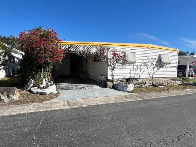 a front view of a house with a outdoor space