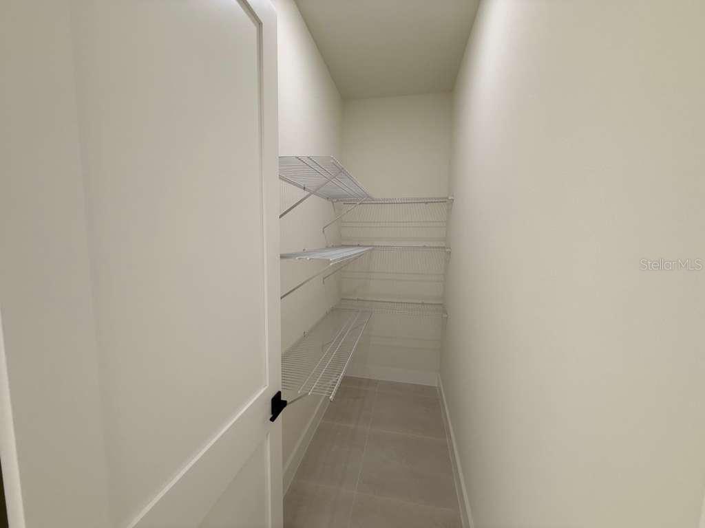 10426 Live Oak Road Port Charlotte, FL 33981 - Photo 37 of 53 close up of a white marble wall