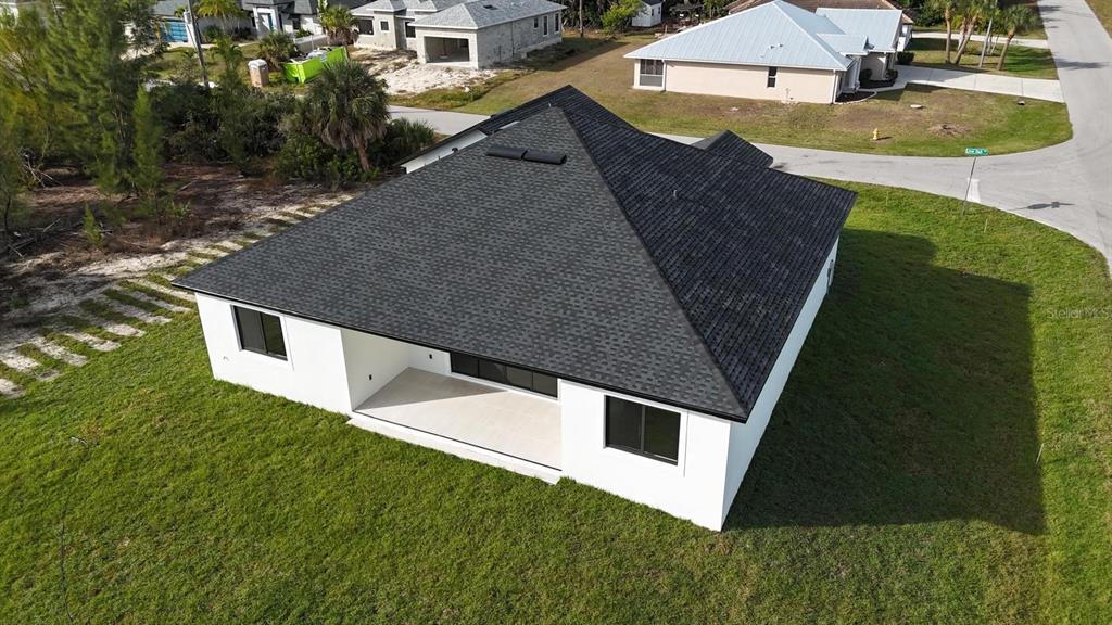 10426 Live Oak Road Port Charlotte, FL 33981 - Photo 8 of 53 a aerial view of a house with a yard