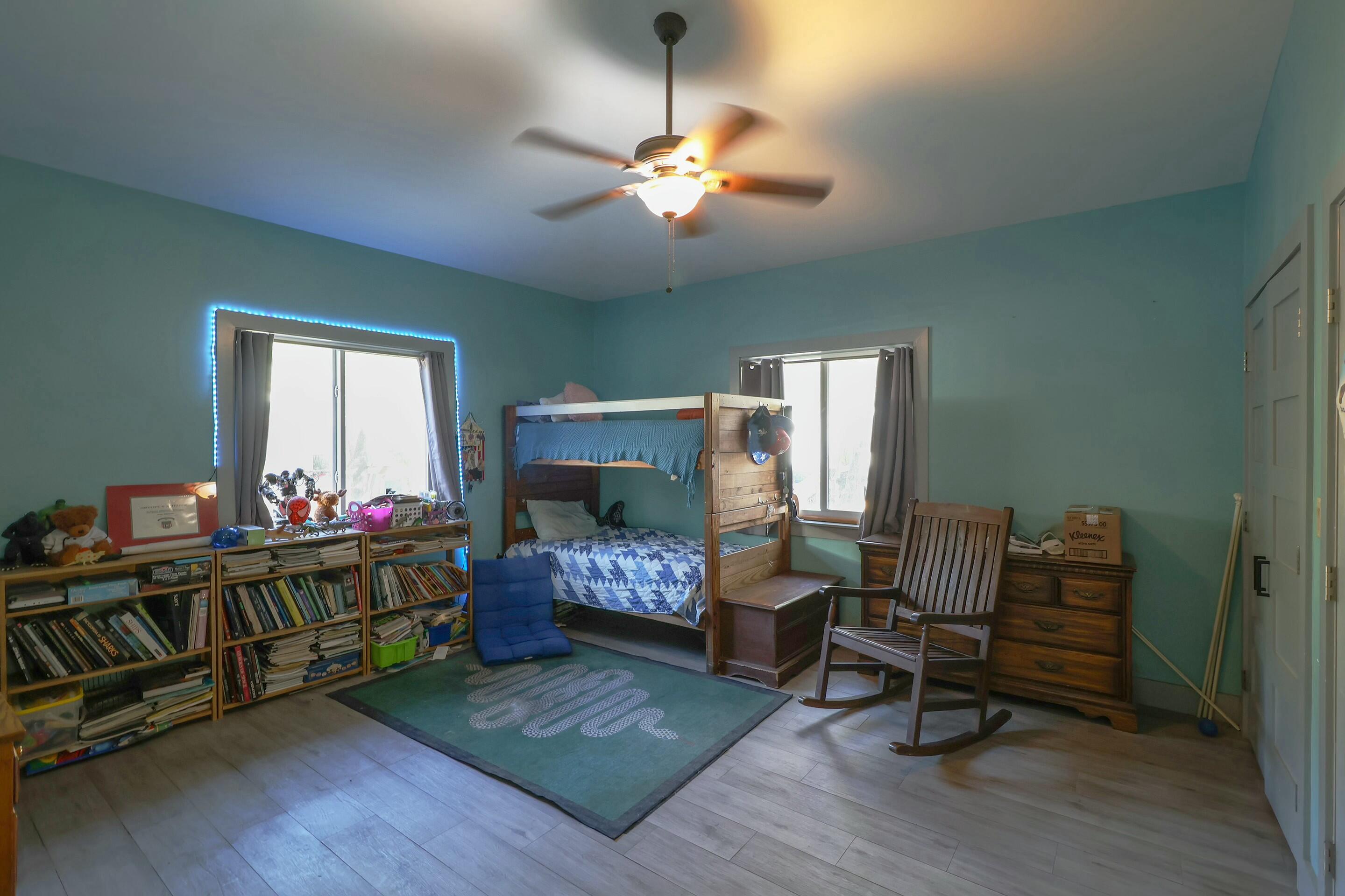 129 Lazy Lane Key Largo, FL 33037 - Photo 18 of 35 a living room with furniture and a wooden floor