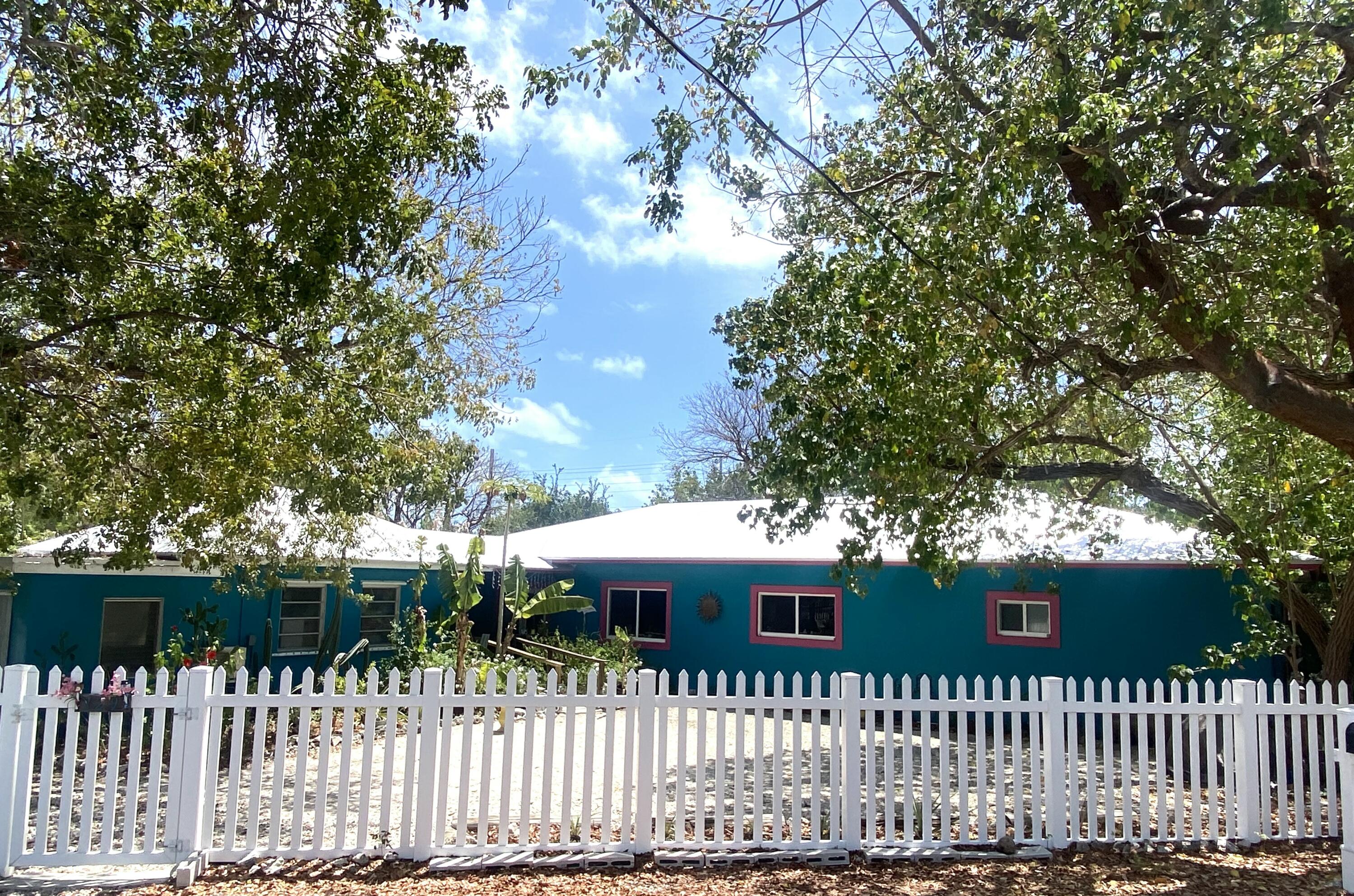 129 Lazy Lane Key Largo, FL 33037 - Photo 2 of 35 a view of a house with a small yard