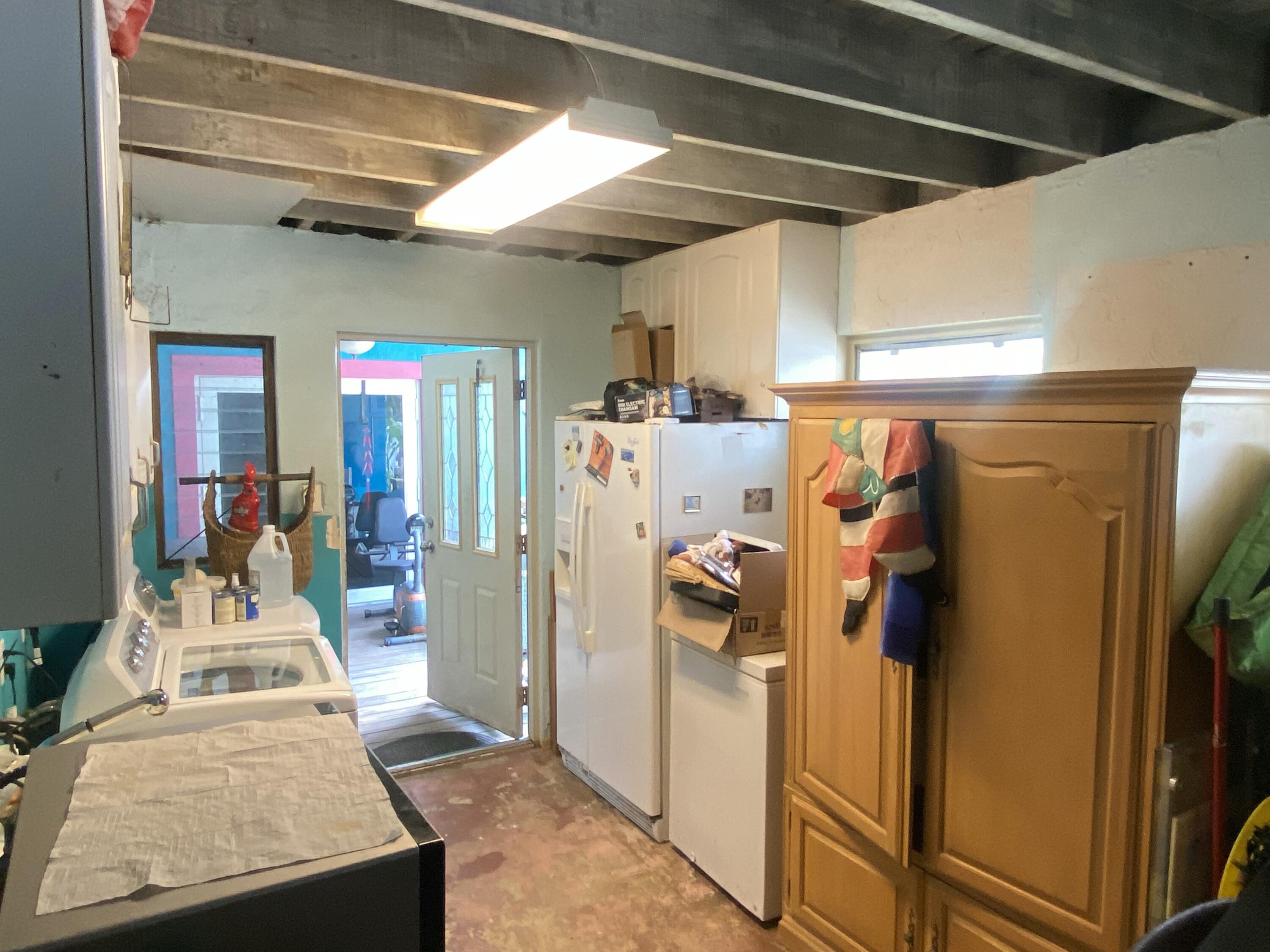 129 Lazy Lane Key Largo, FL 33037 - Photo 30 of 35 a view of a room with gym equipment