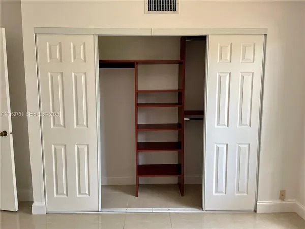 a view of a livingroom with a closet