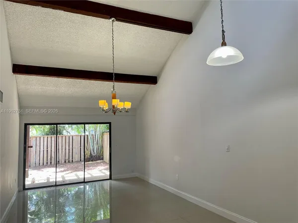 a dining room with a window