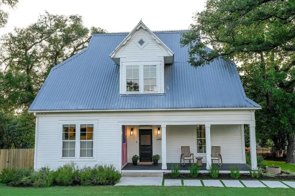 front view of a house with a yard