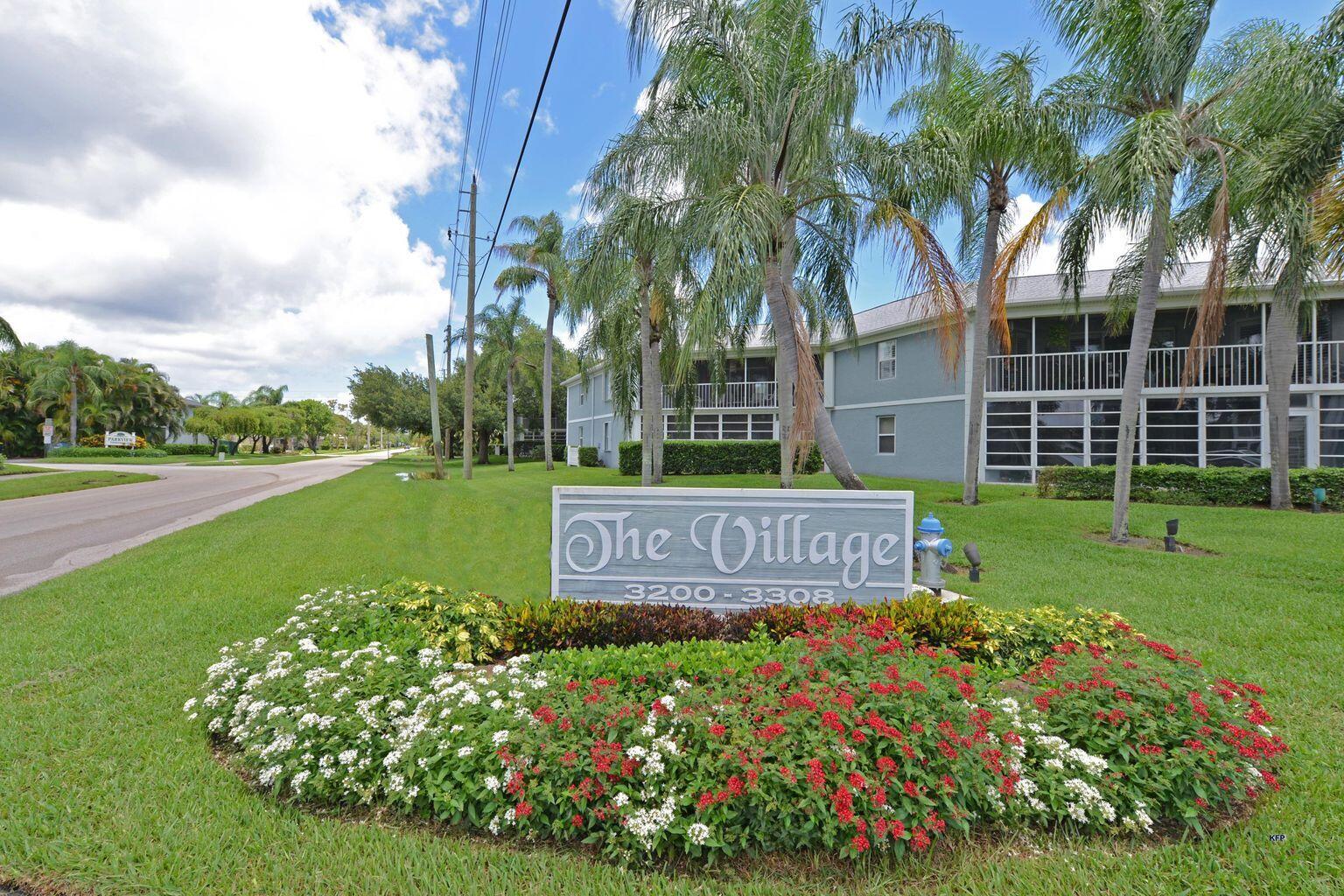 3254 Southeast Aster Lane, Unit 239 Stuart, FL 34994 - Photo 24 of 24 a view of a park that has sign board