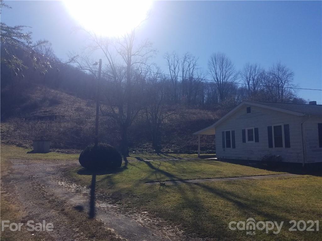 1118 Camp Branch Road Waynesville, NC 28786 - Photo 5 of 30 a house view with a garden space