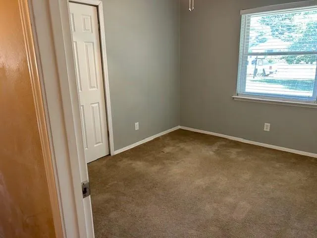 an empty room with a window