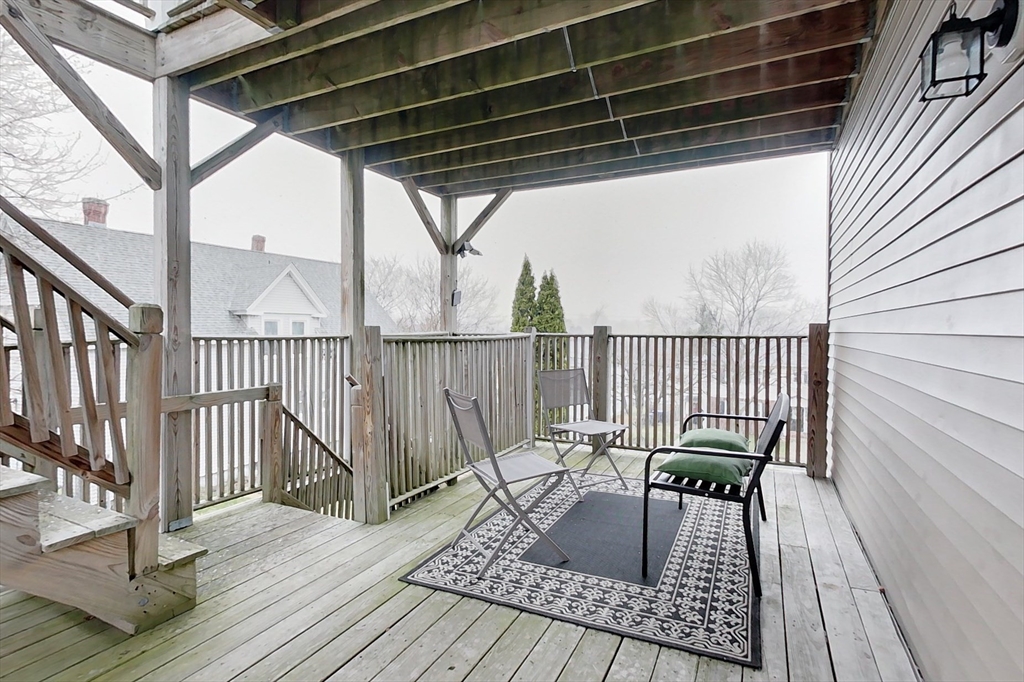 6 Kendall Street Methuen, MA 01844 - Photo 23 of 42 a view of balcony with wooden floor and outdoor seating