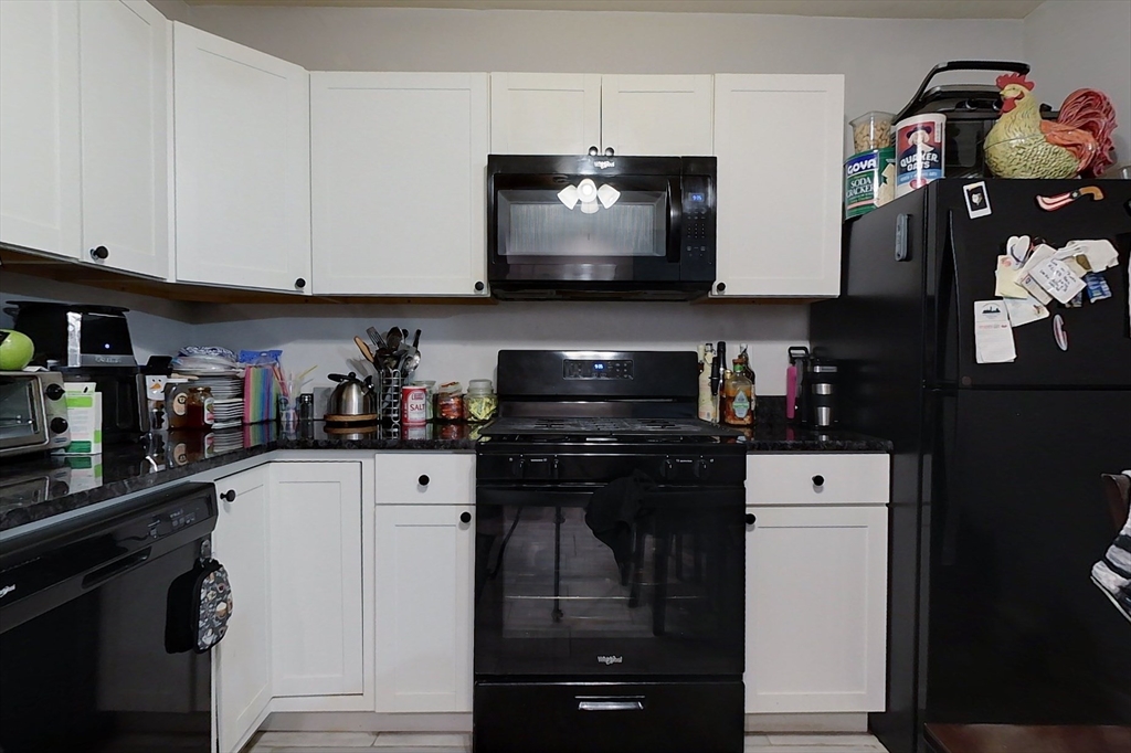 6 Kendall Street Methuen, MA 01844 - Photo 24 of 42 a kitchen with stainless steel appliances granite countertop a stove and a refrigerator