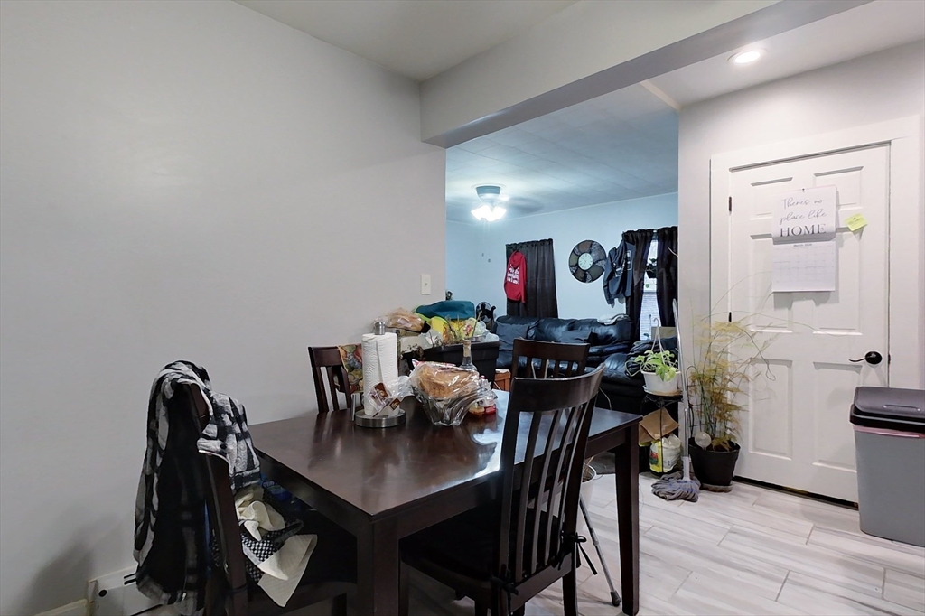 6 Kendall Street Methuen, MA 01844 - Photo 26 of 42 a view of a dining room with furniture and wooden floor