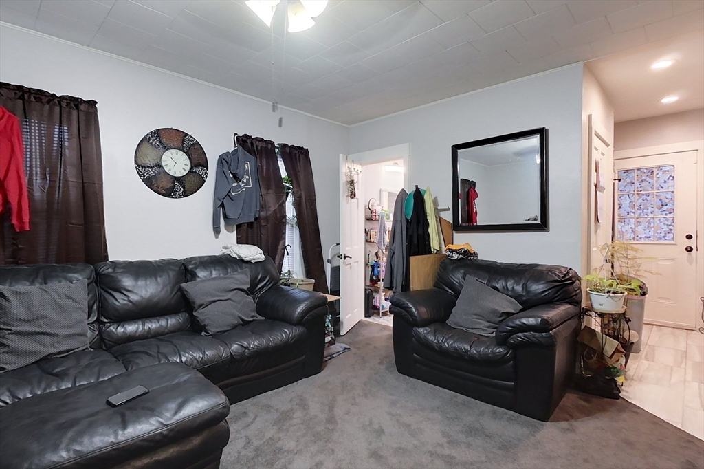 6 Kendall Street Methuen, MA 01844 - Photo 28 of 42 a living room with furniture and a window