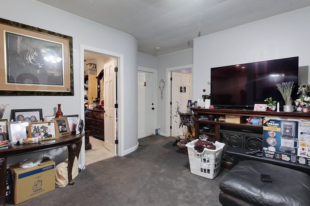 6 Kendall Street Methuen, MA 01844 - Photo 29 of 42 a living room with furniture and a flat screen tv