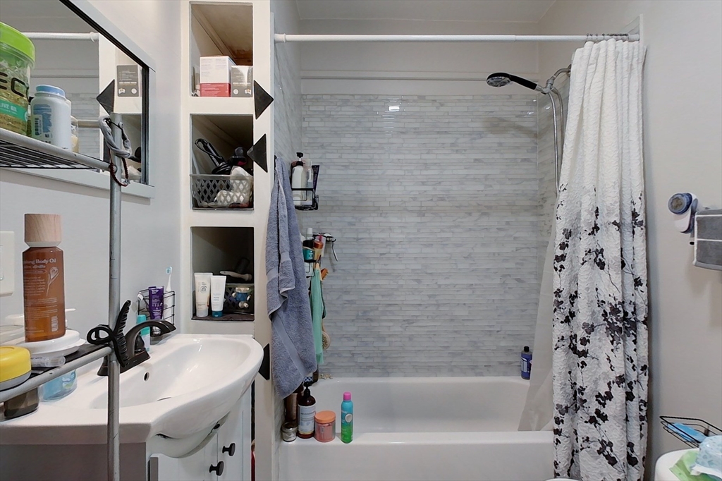 6 Kendall Street Methuen, MA 01844 - Photo 32 of 42 a bathroom with a bathtub and shower