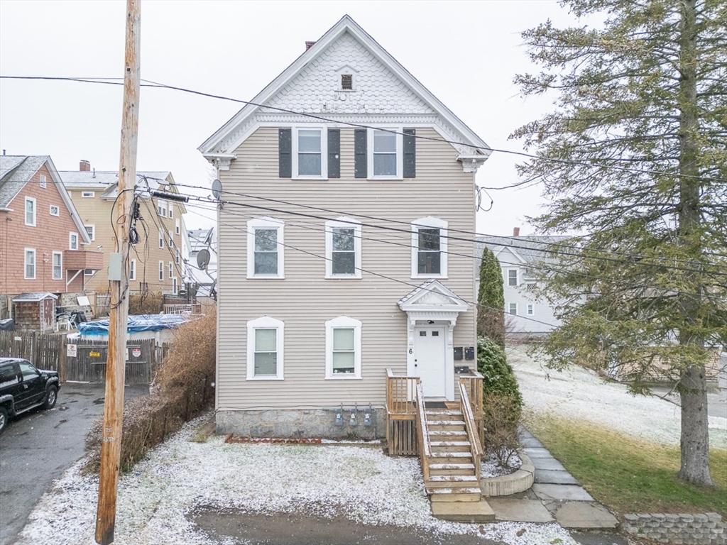 6 Kendall Street Methuen, MA 01844 - Photo 35 of 42 a front view of a house with a yard