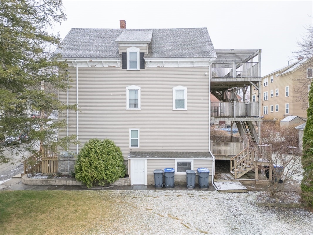 6 Kendall Street Methuen, MA 01844 - Photo 36 of 42 a front view of a house with garden