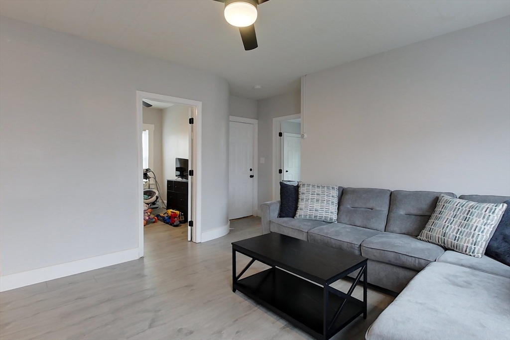 6 Kendall Street Methuen, MA 01844 - Photo 8 of 42 a living room with furniture