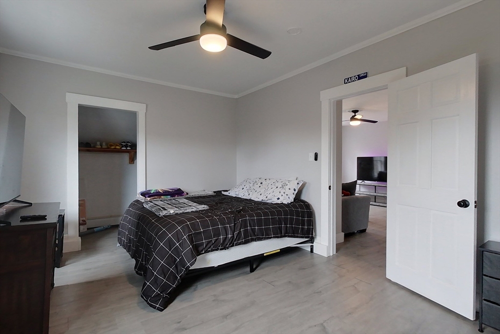 6 Kendall Street Methuen, MA 01844 - Photo 10 of 42 a bedroom with a bed and a ceiling fan