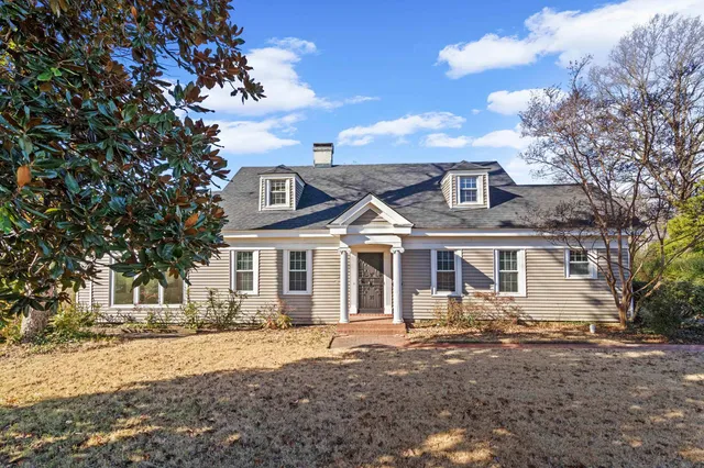 front view of a house with a dry yard