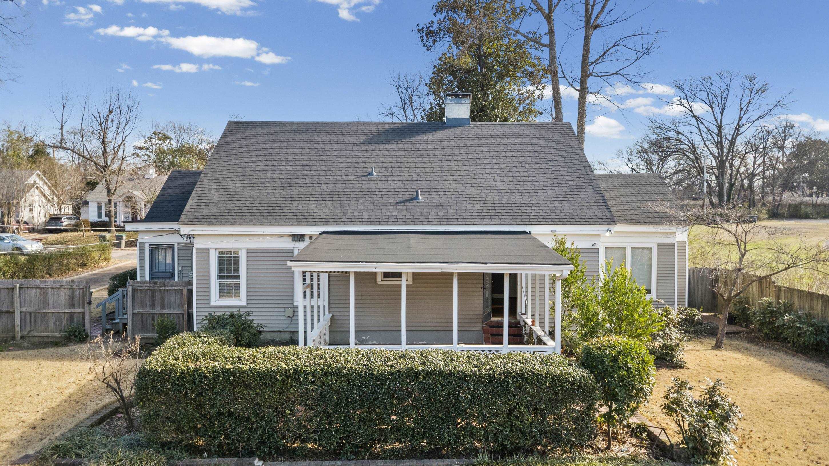 693 Holly Street Memphis, TN 38112 - Photo 29 of 32 a view of a house with a garden