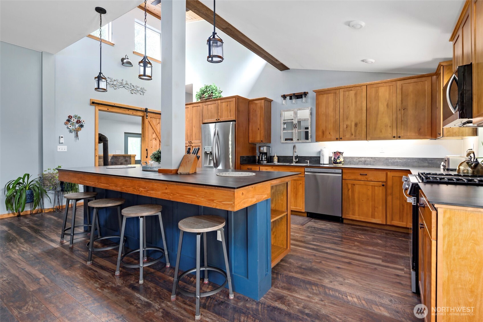 25451 Lake Cavanaugh Road Mount Vernon, WA 98274 - Photo 11 of 40 a kitchen with stainless steel appliances granite countertop wooden cabinets and sink