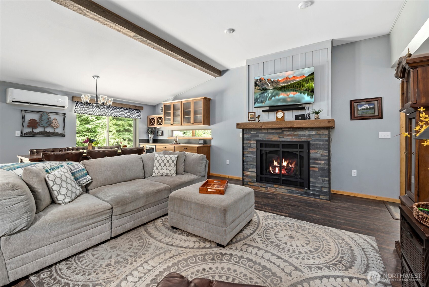 25451 Lake Cavanaugh Road Mount Vernon, WA 98274 - Photo 13 of 40 a living room with furniture and a fireplace