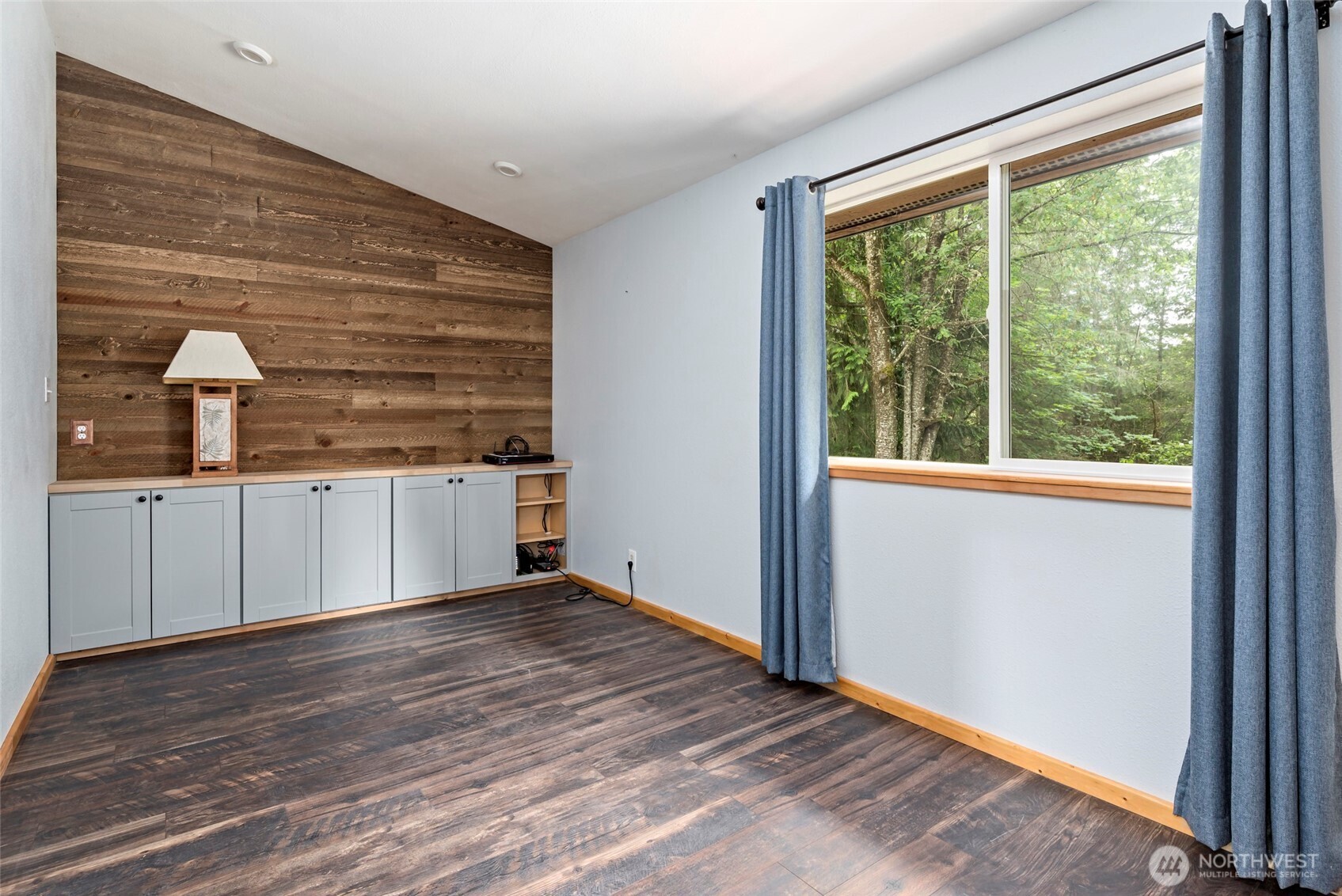 25451 Lake Cavanaugh Road Mount Vernon, WA 98274 - Photo 16 of 40 a view of a kitchen with a sink and wooden floor