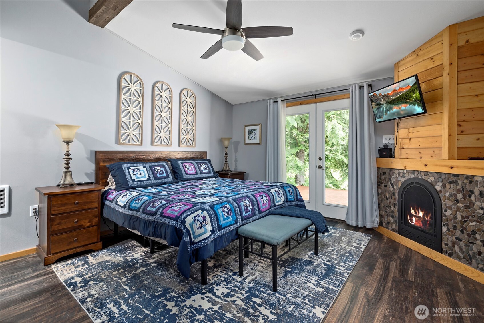 25451 Lake Cavanaugh Road Mount Vernon, WA 98274 - Photo 17 of 40 a bedroom with a bed dresser and a window