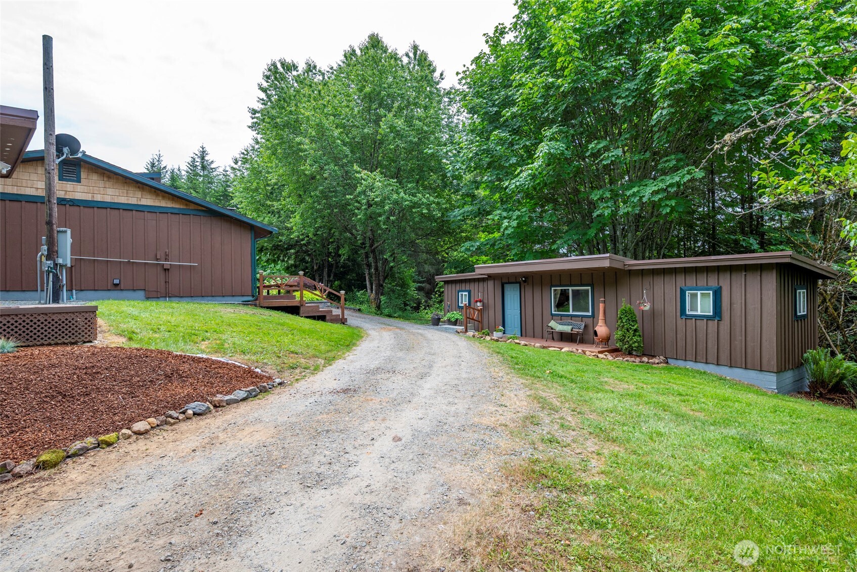 25451 Lake Cavanaugh Road Mount Vernon, WA 98274 - Photo 26 of 40 a view of a yard in front of a house with large tree