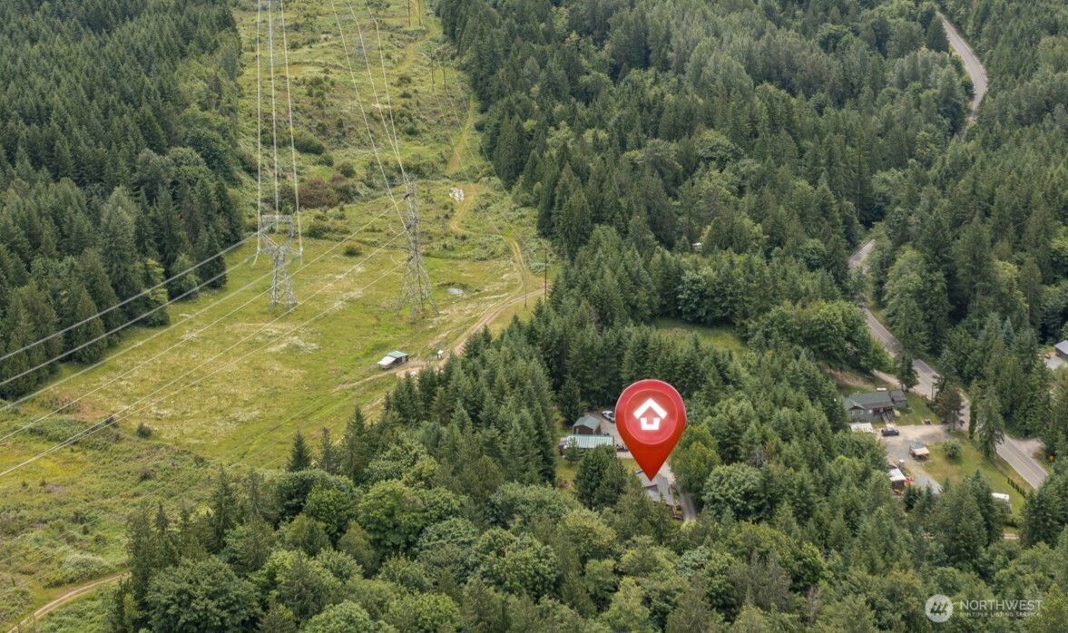 25451 Lake Cavanaugh Road Mount Vernon, WA 98274 - Photo 36 of 40 a view of street sign of a forest