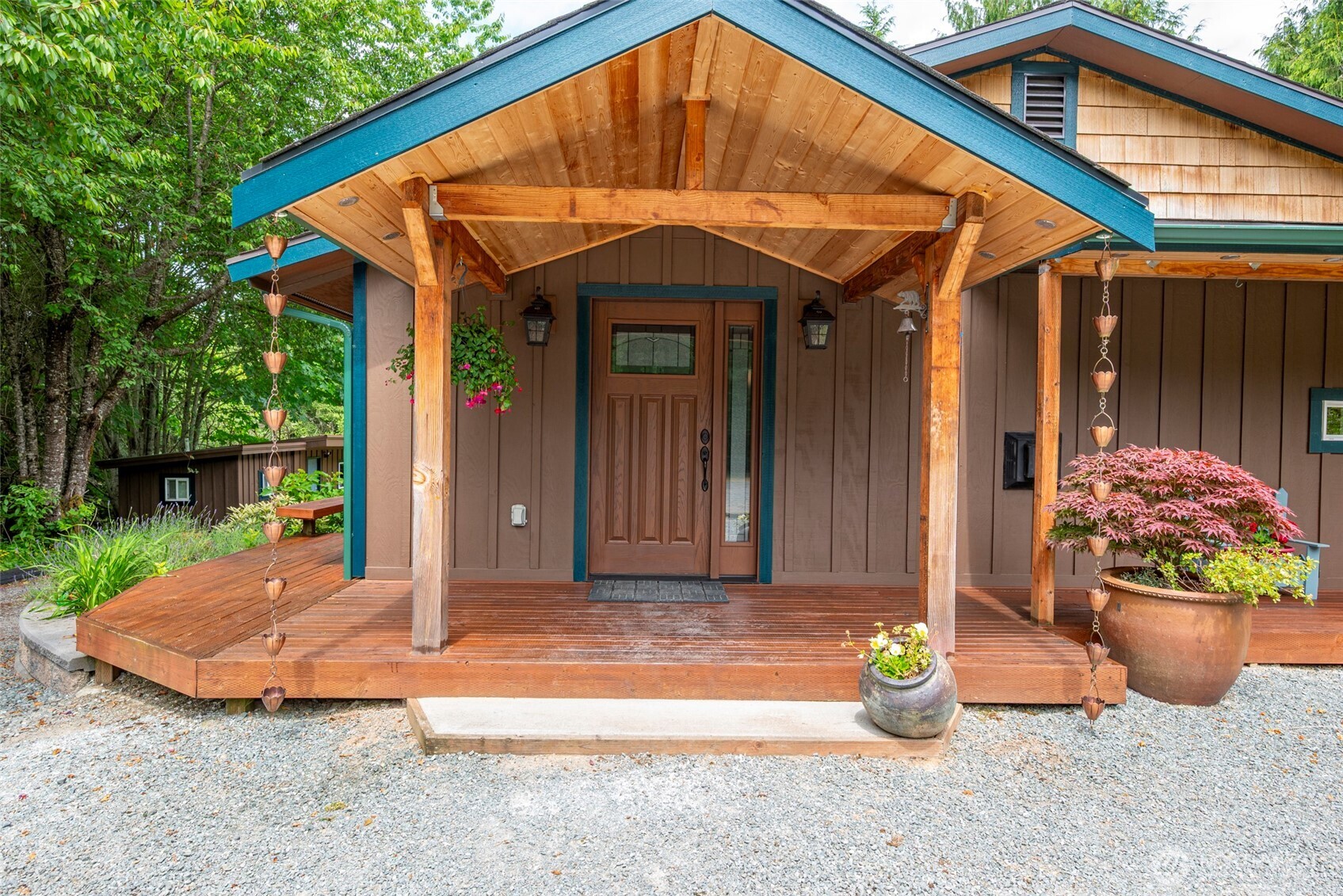 25451 Lake Cavanaugh Road Mount Vernon, WA 98274 - Photo 4 of 40 a front view of a house with a porch