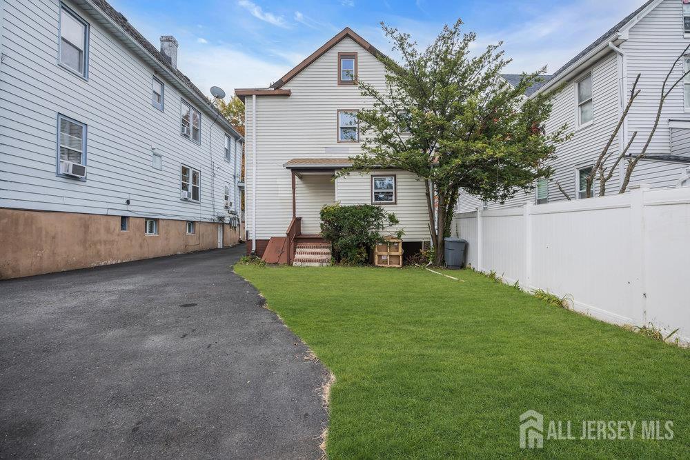 49 Comstock Street New Brunswick, NJ 08901 - Photo 19 of 20 a house view with a garden space
