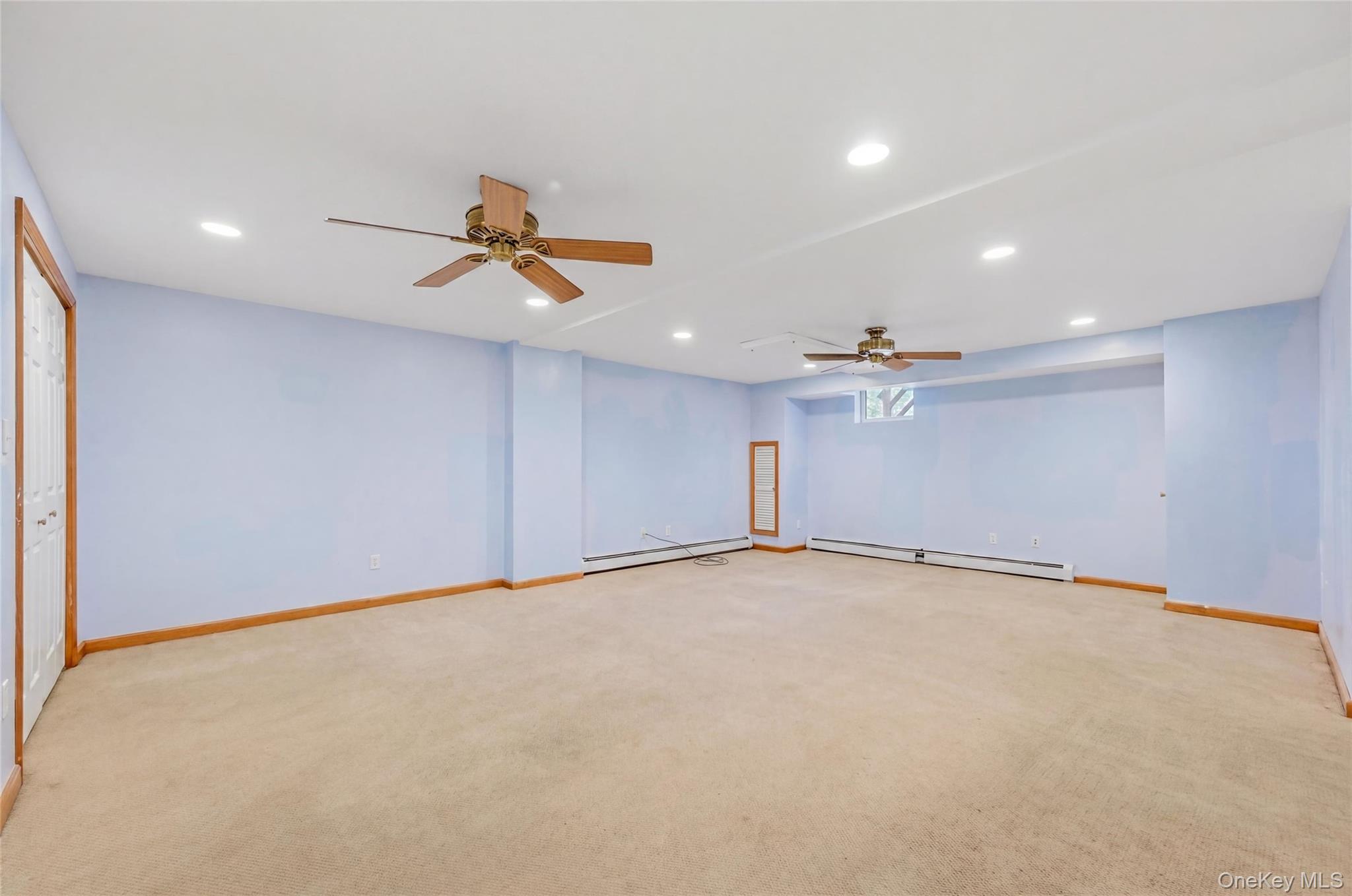 5 Horton Road Washingtonville, NY 10992 - Photo 30 of 42 an empty room with ceiling fan and window