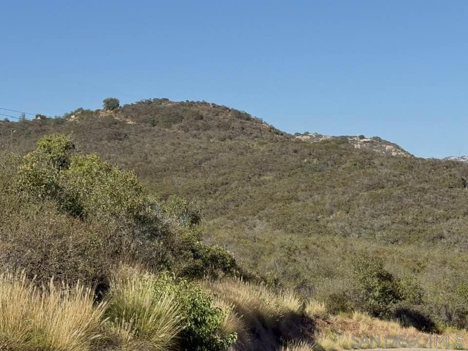 2477 Lookout Mountain Road Fallbrook, CA 92028 - Photo 2 of 3 a view of a large mountain with mountains in the background