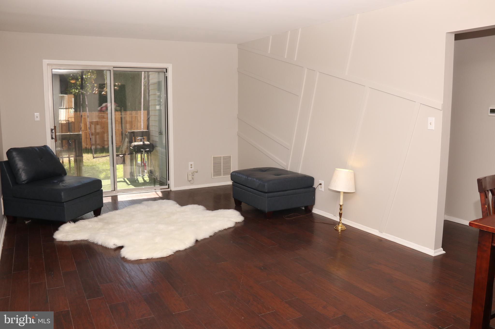 606 Woodchip Road Lumberton, NJ 08048 - Photo 2 of 18 a living room with furniture and a potted plant