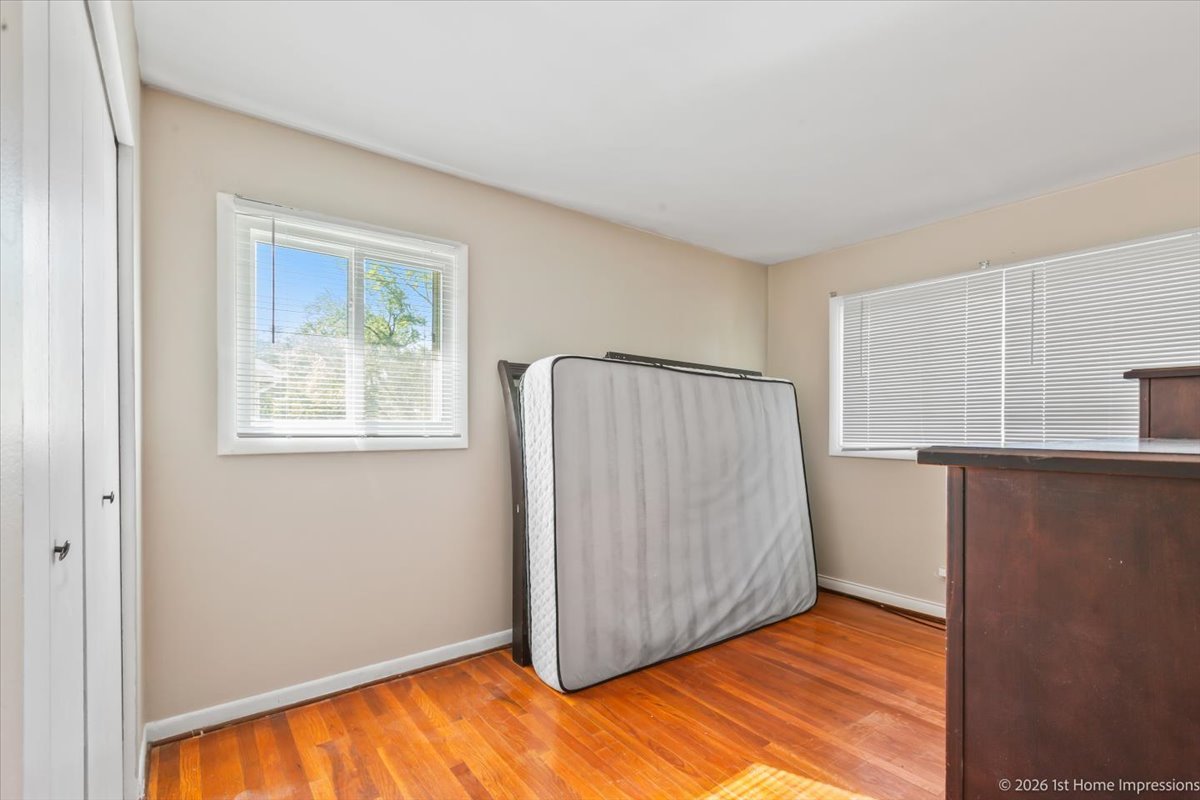 18847 May Avenue Homewood, IL 60430 - Photo 15 of 26 a view of a livingroom with wooden floor and a window
