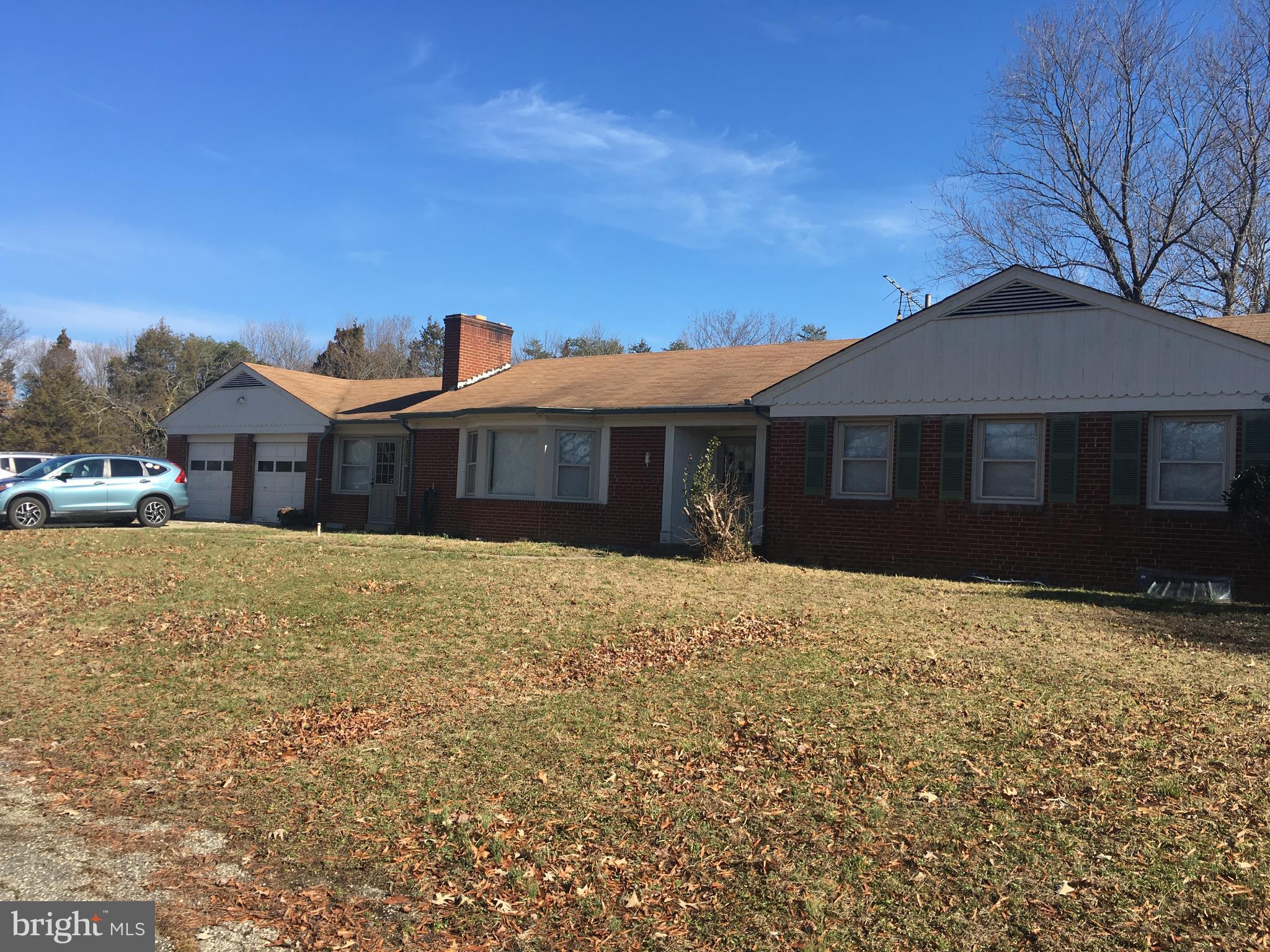 7300 Temple Hill Road Temple Hills, MD 20748 - Photo 1 of 14 a front view of a house with a yard