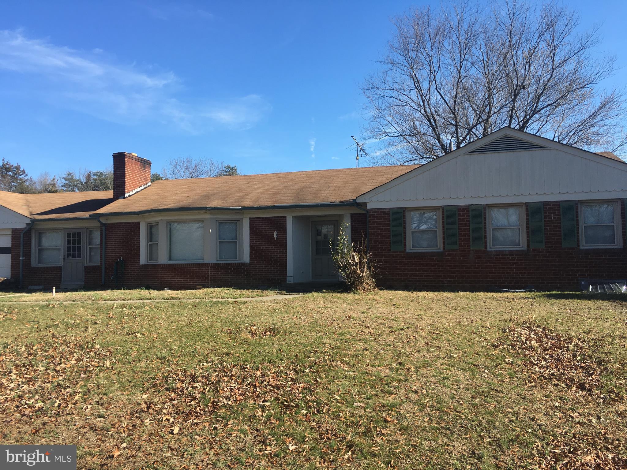7300 Temple Hill Road Temple Hills, MD 20748 - Photo 11 of 14 a front view of a house with a yard