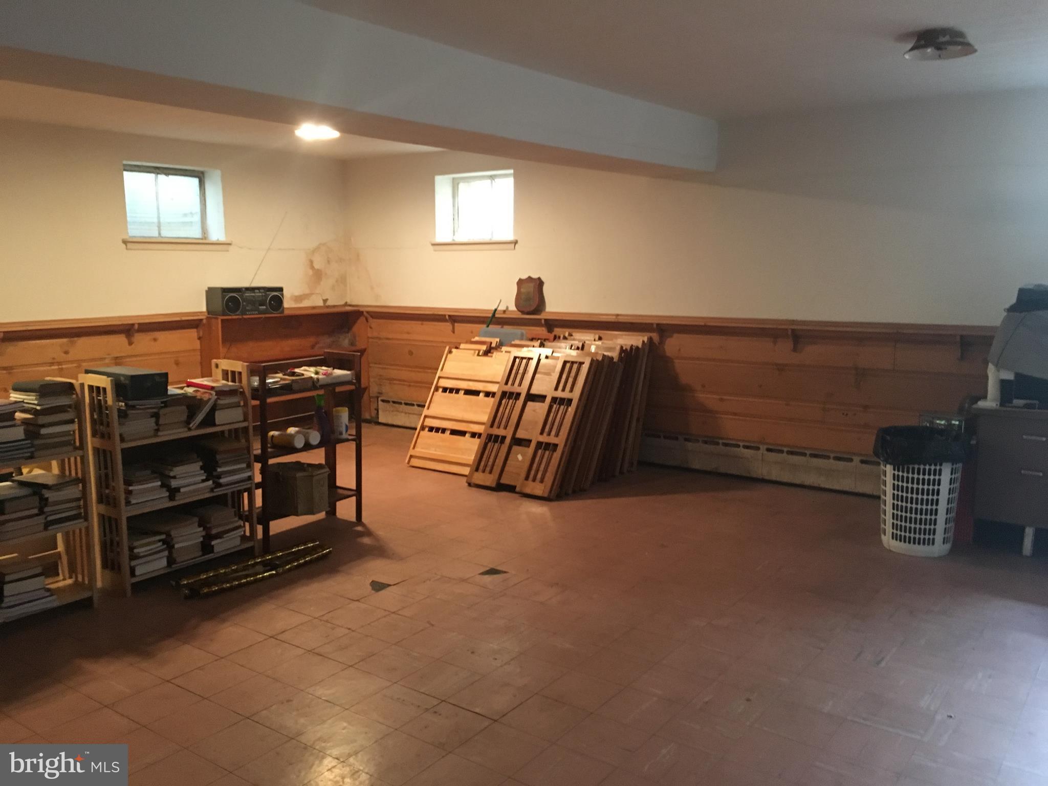 7300 Temple Hill Road Temple Hills, MD 20748 - Photo 12 of 14 a room with furniture and storage