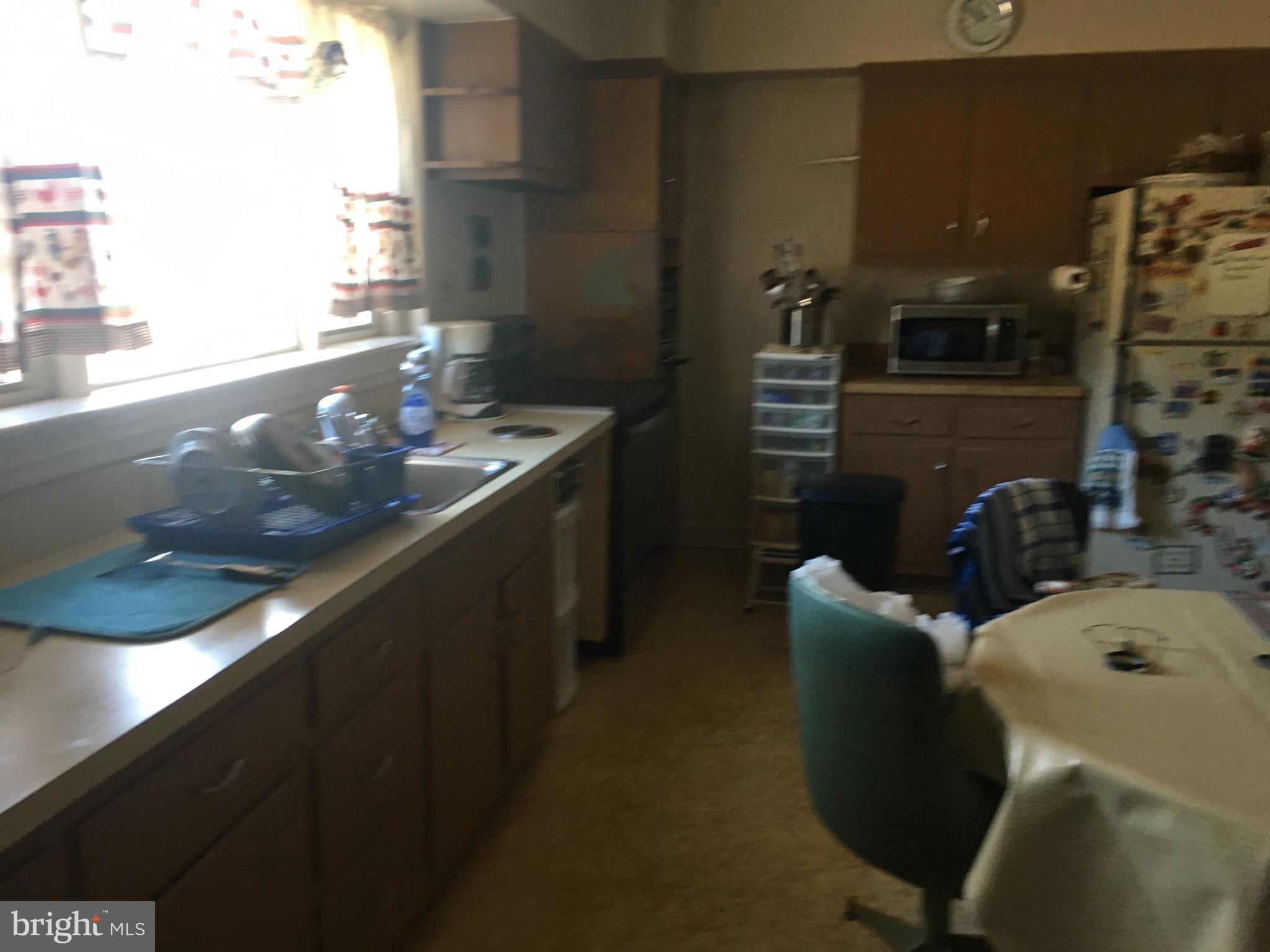 7300 Temple Hill Road Temple Hills, MD 20748 - Photo 5 of 14 a bathroom with a sink and mirror